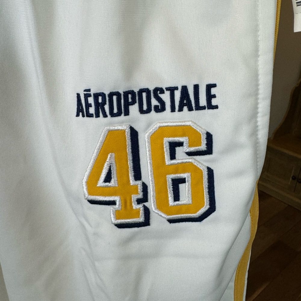 Aeropostale white with blue and yellow accents athletic pants